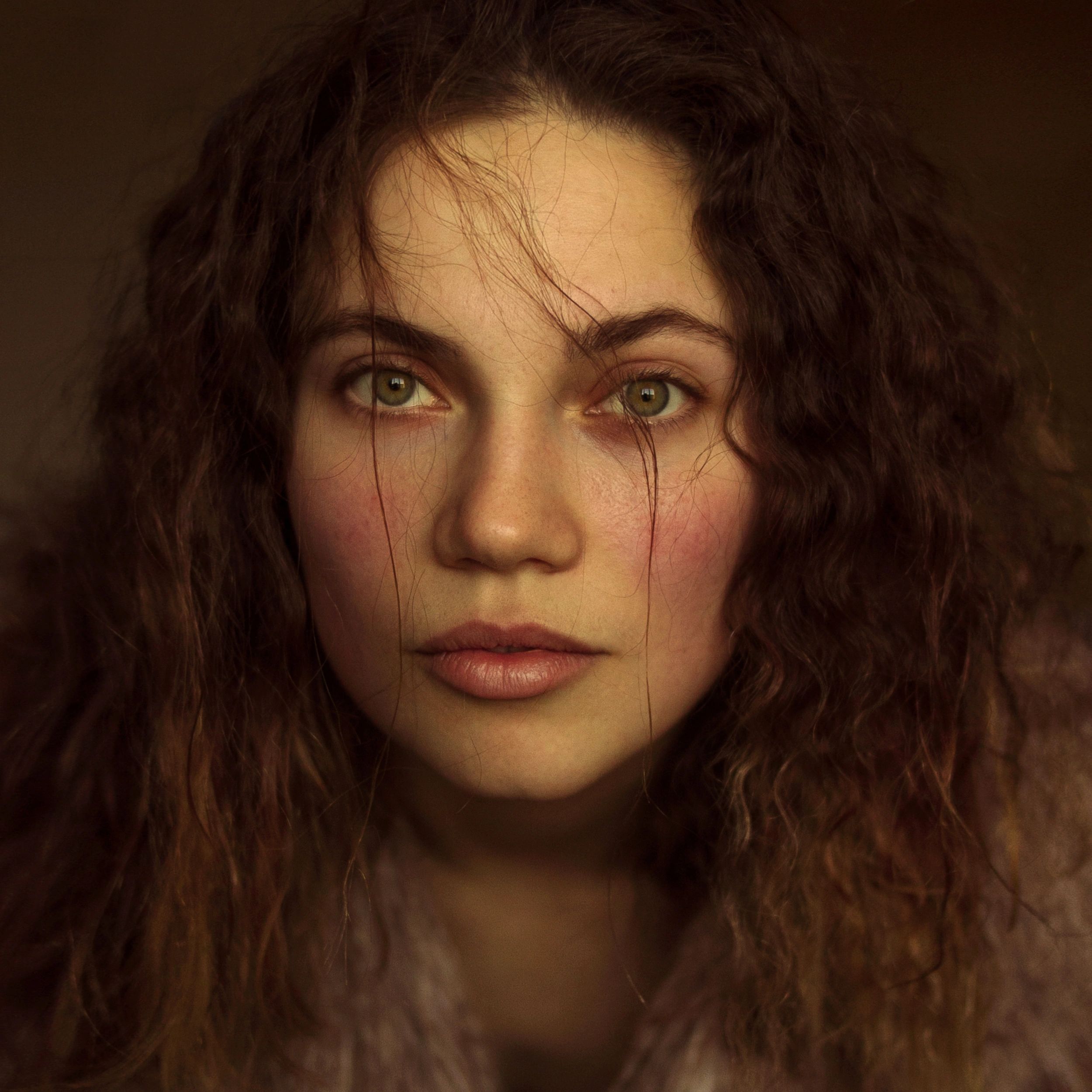 Warm editorial portrait of a woman