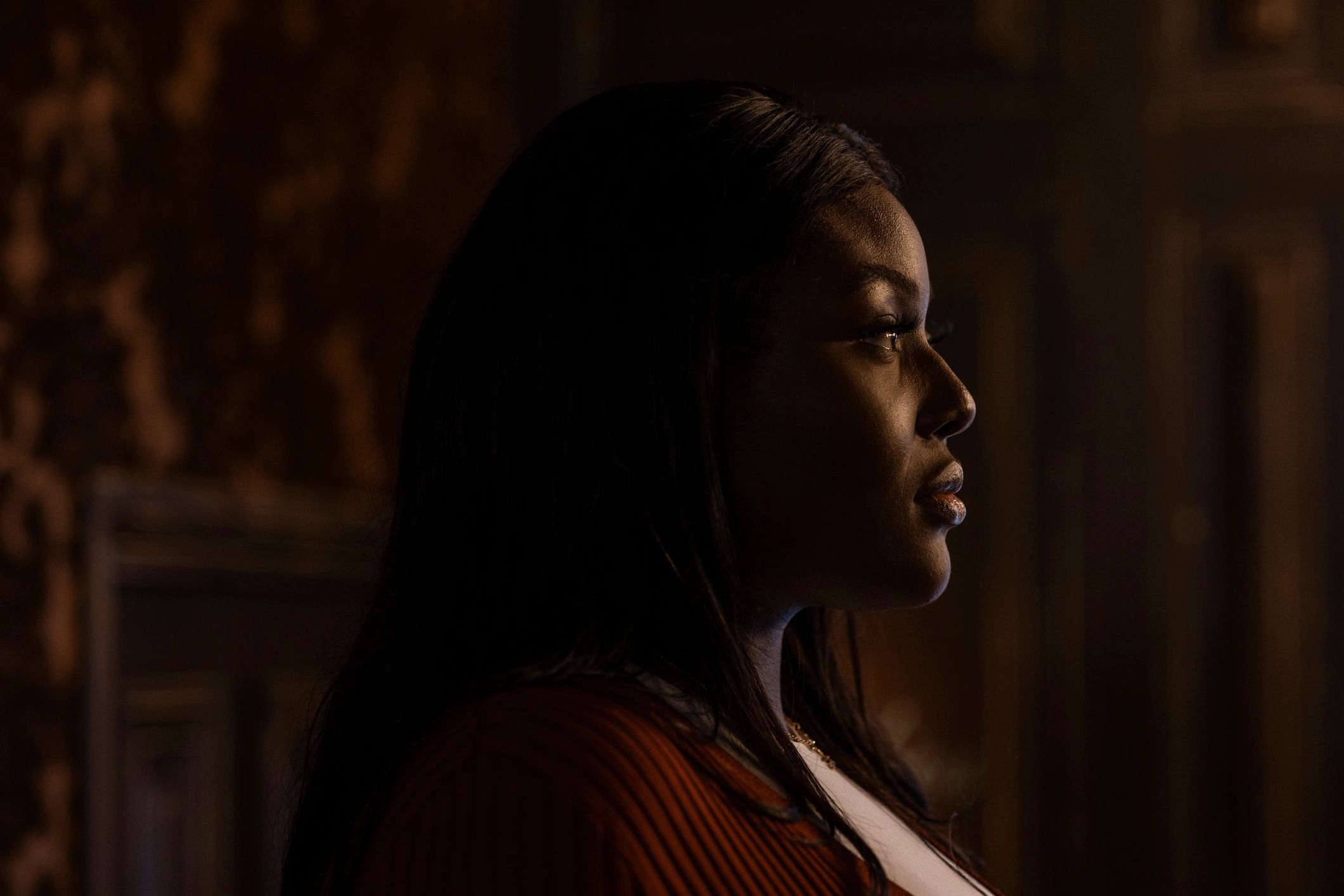 Moody portrait silhouette of a woman with soft light